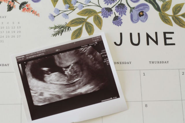 Baby scan photo on calendar showing June 2017