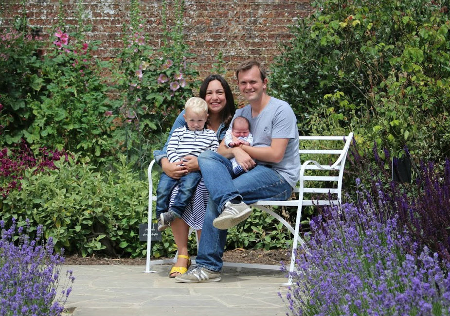 Katy, John, Max and Ben sat on bench at Polesden Lacey