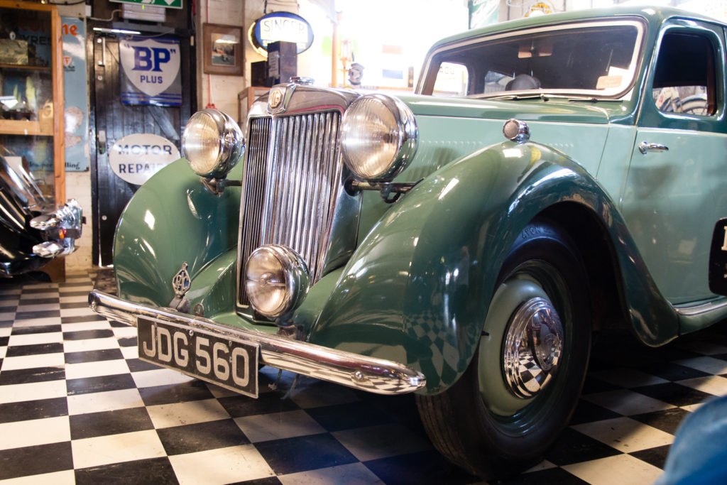 Vintage green car at Motor Museum at Bourton on the Water